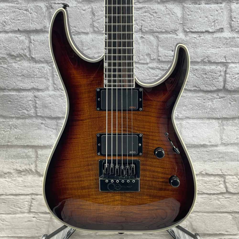 Used:  ESP LTD Deluxe MH-1000 Evertune Electric Guitar - Sunset