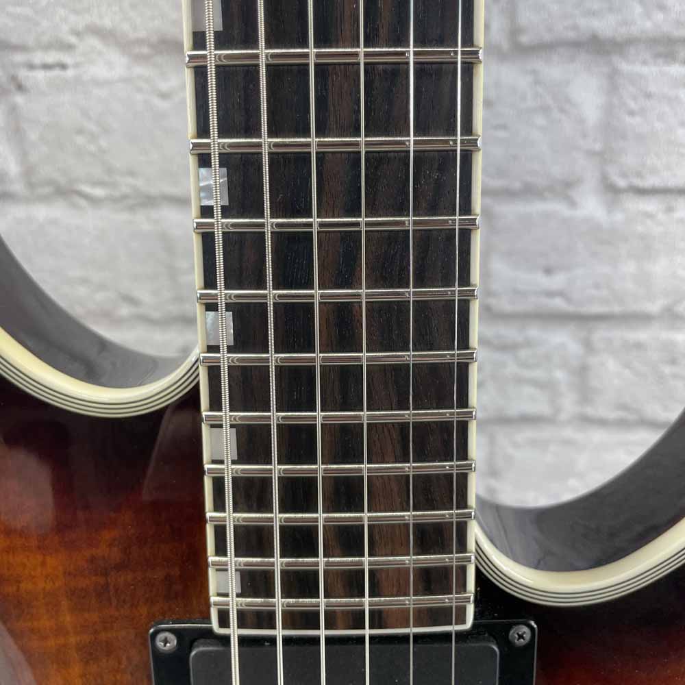 Used:  ESP LTD Deluxe MH-1000 Evertune Electric Guitar - Sunset