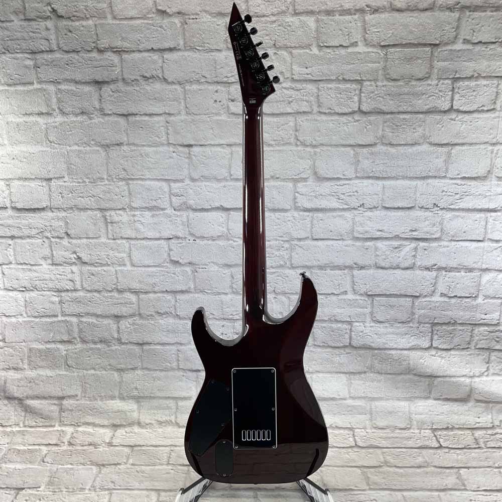 Used:  ESP LTD Deluxe MH-1000 Evertune Electric Guitar - Sunset