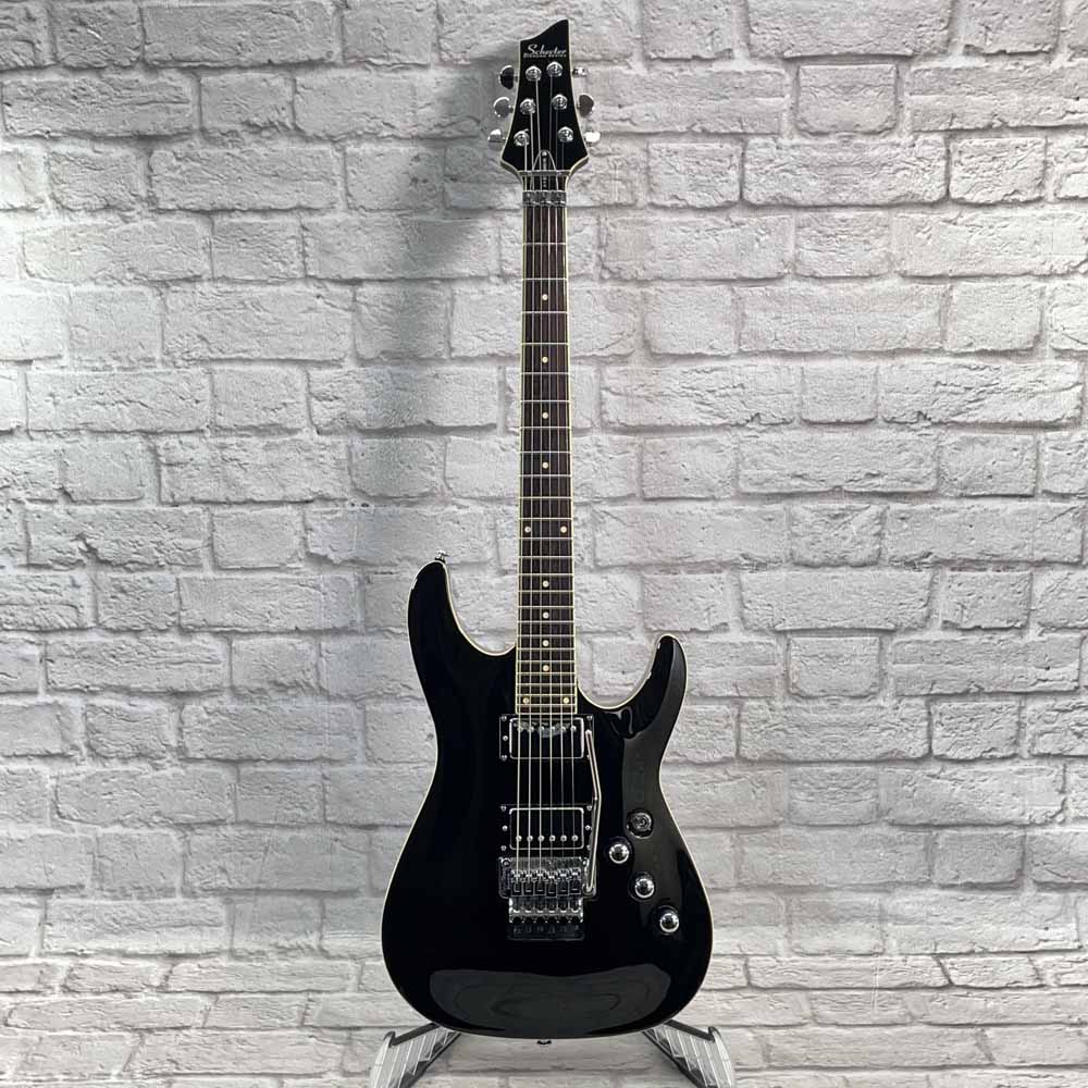 Used:  Schecter C-1 FR Standard - Gloss Black - Floyd Rose