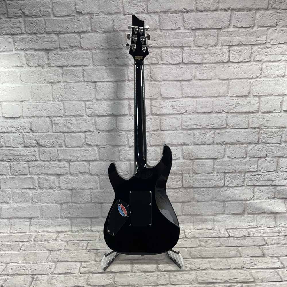 Used:  Schecter C-1 FR Standard - Gloss Black - Floyd Rose