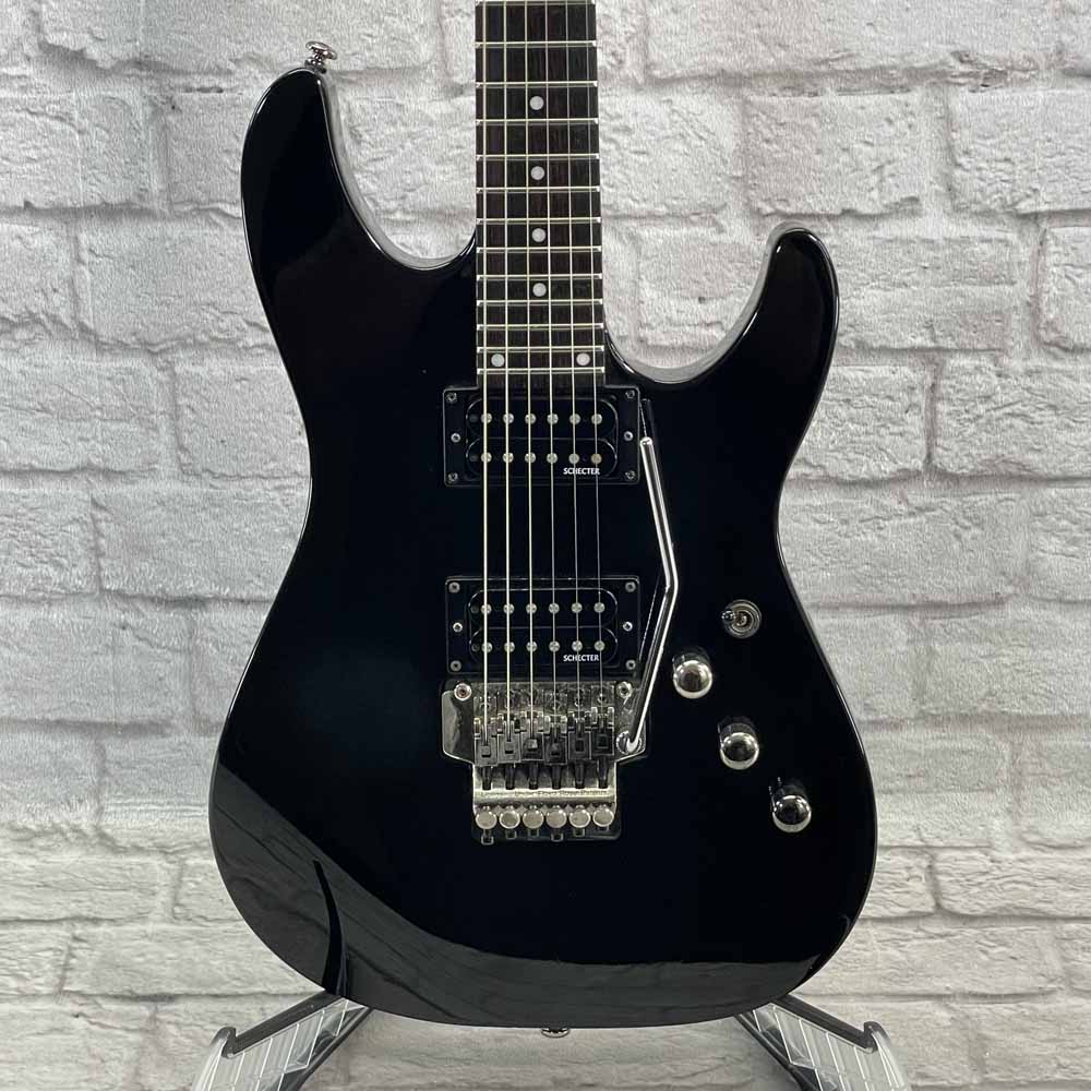 Used:  Schecter Diamond Series Sunset Deluxe Electric Guitar - Black