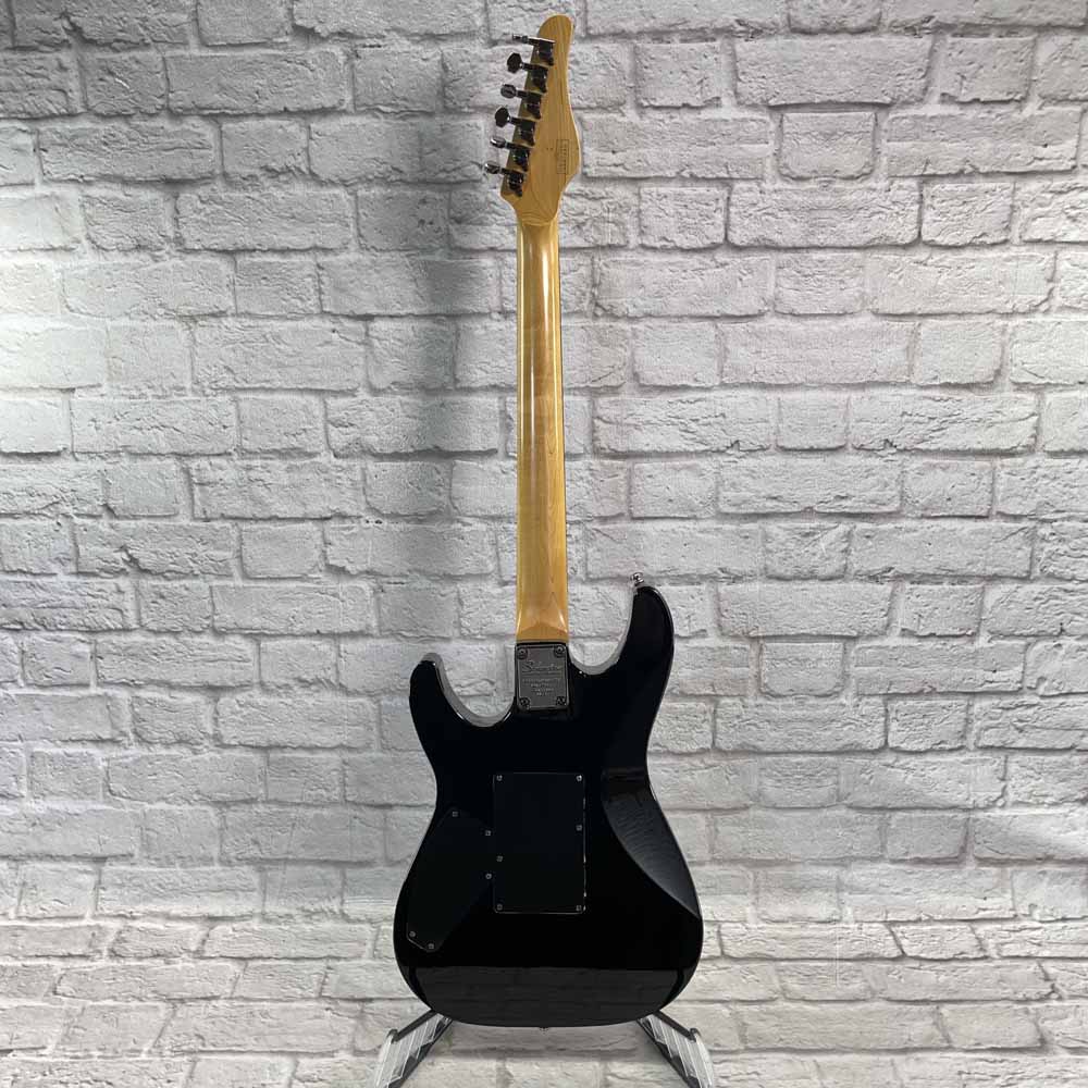 Used:  Schecter Diamond Series Sunset Deluxe Electric Guitar - Black