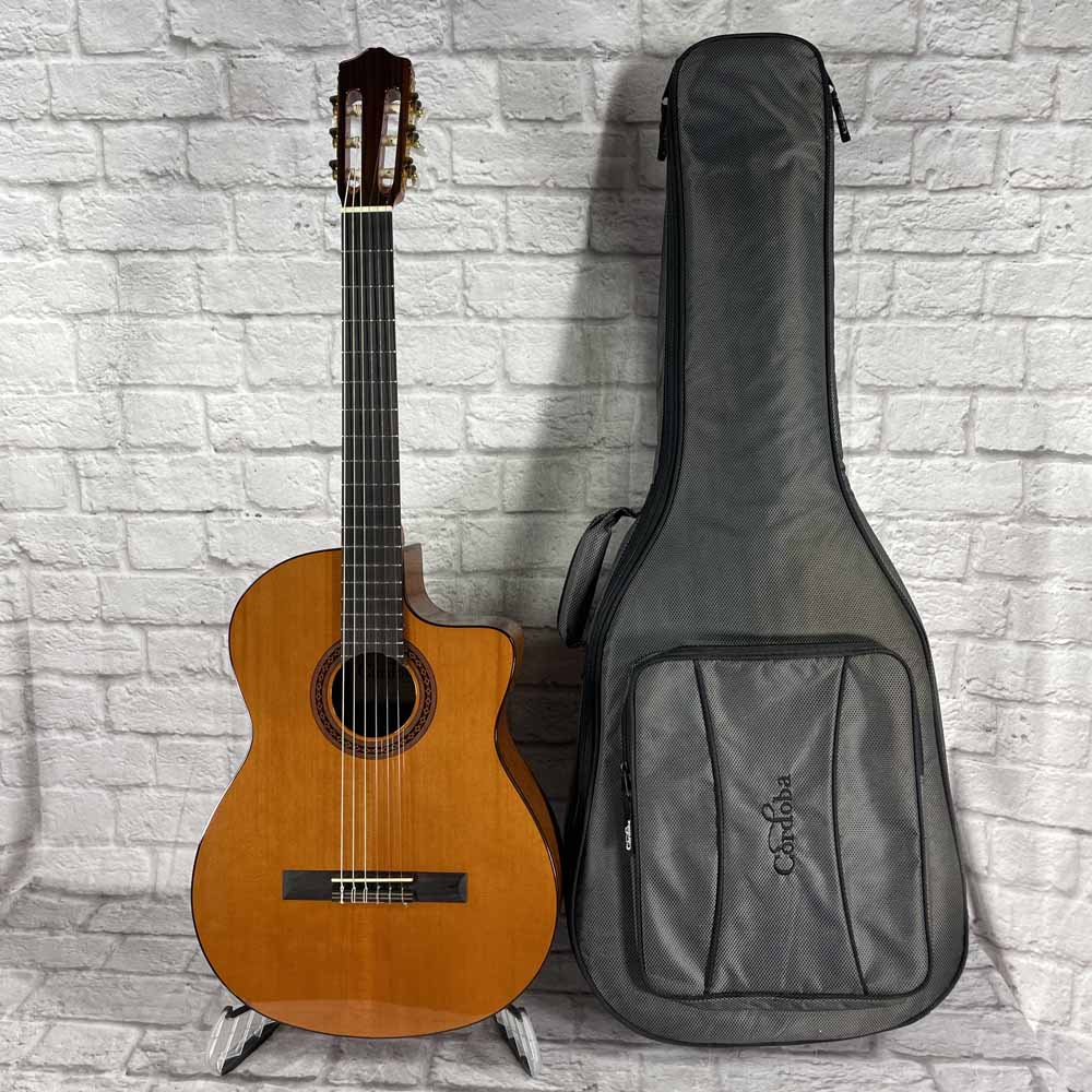 Used:  Cordoba C5-CE Acoustic Electric Classical Guitar