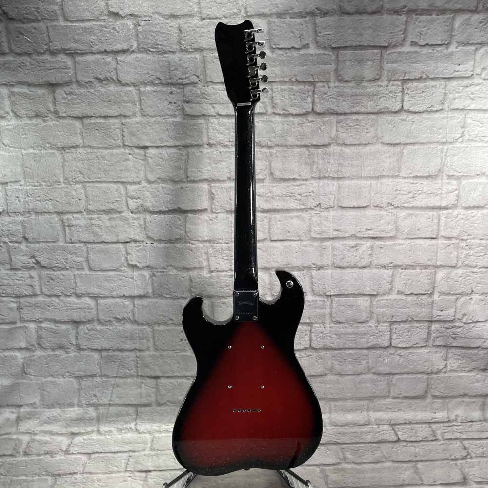 Used:   TeleStar Mona Black & Red Sparkle Electric Guitar w/ Amp in Case