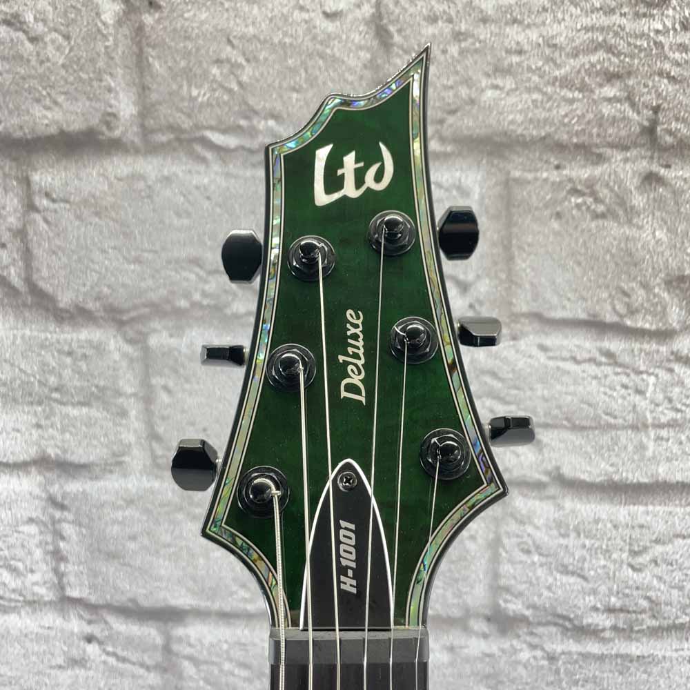 Used:  ESP LTD Deluxe H-1001 QM Electric Guitar
