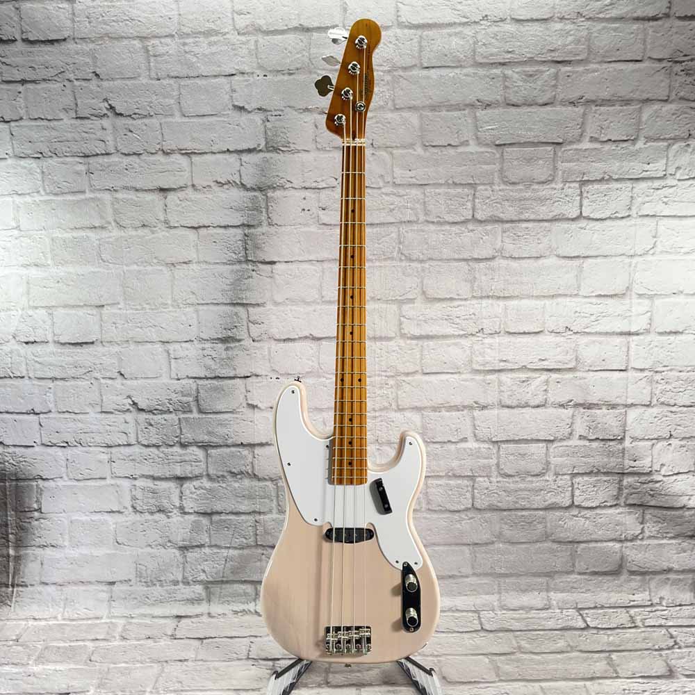 Used:  Squier Classic Vibe '50s Precision Bass - Transparent Pink