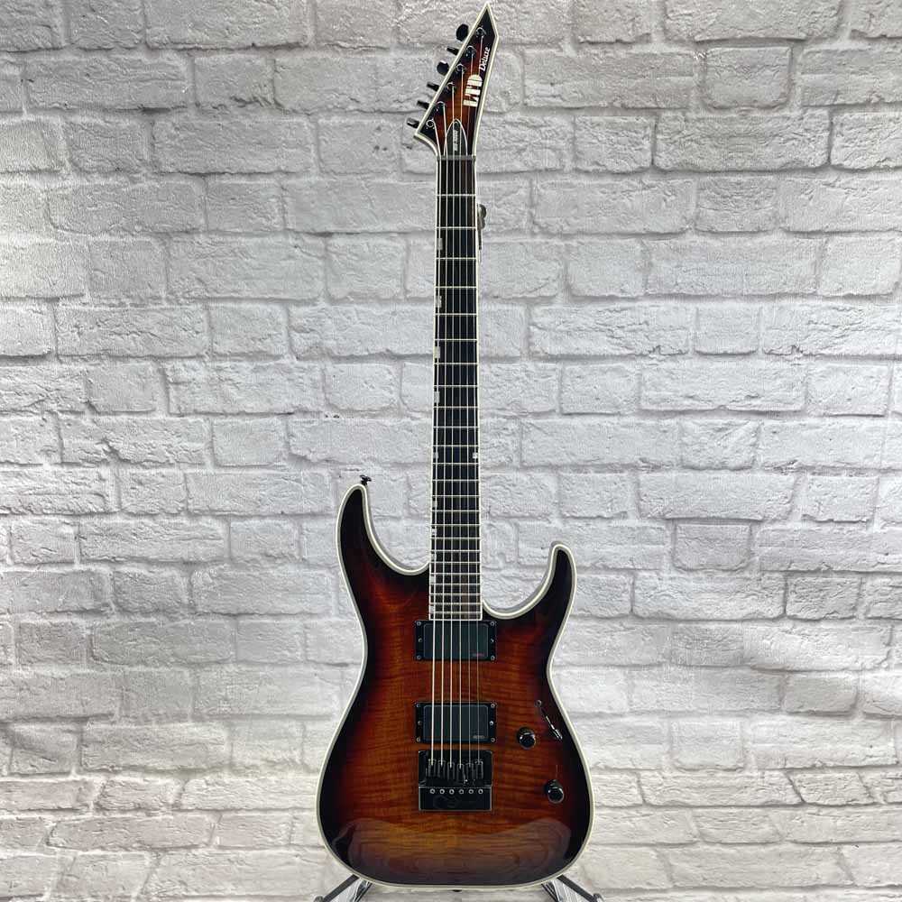 Used:  ESP LTD Deluxe MH-1000 Evertune Electric Guitar - Sunset