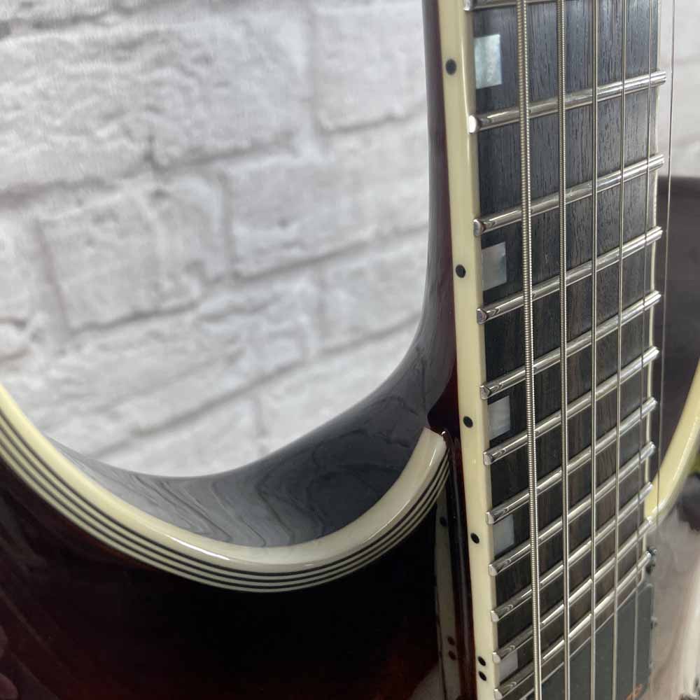 Used:  ESP LTD Deluxe MH-1000 Evertune Electric Guitar - Sunset