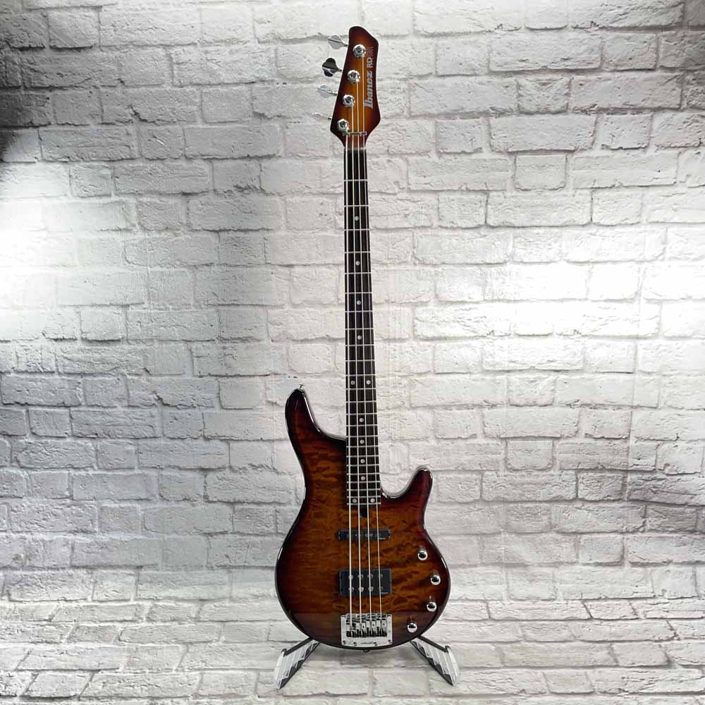 Used:  Ibanez Road Gear RDGR 4-String  Bass Guitar -Sunburst Quilt Top