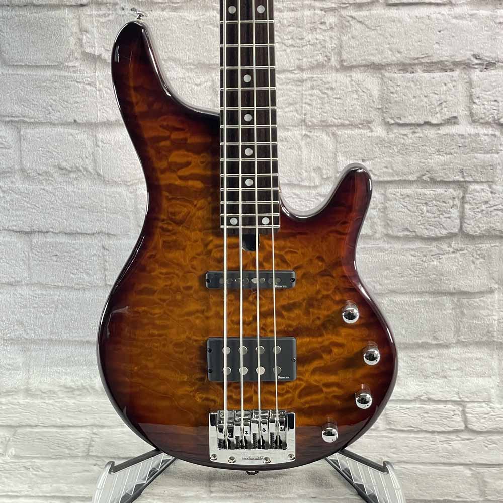 Used:  Ibanez Road Gear RDGR 4-String  Bass Guitar -Sunburst Quilt Top