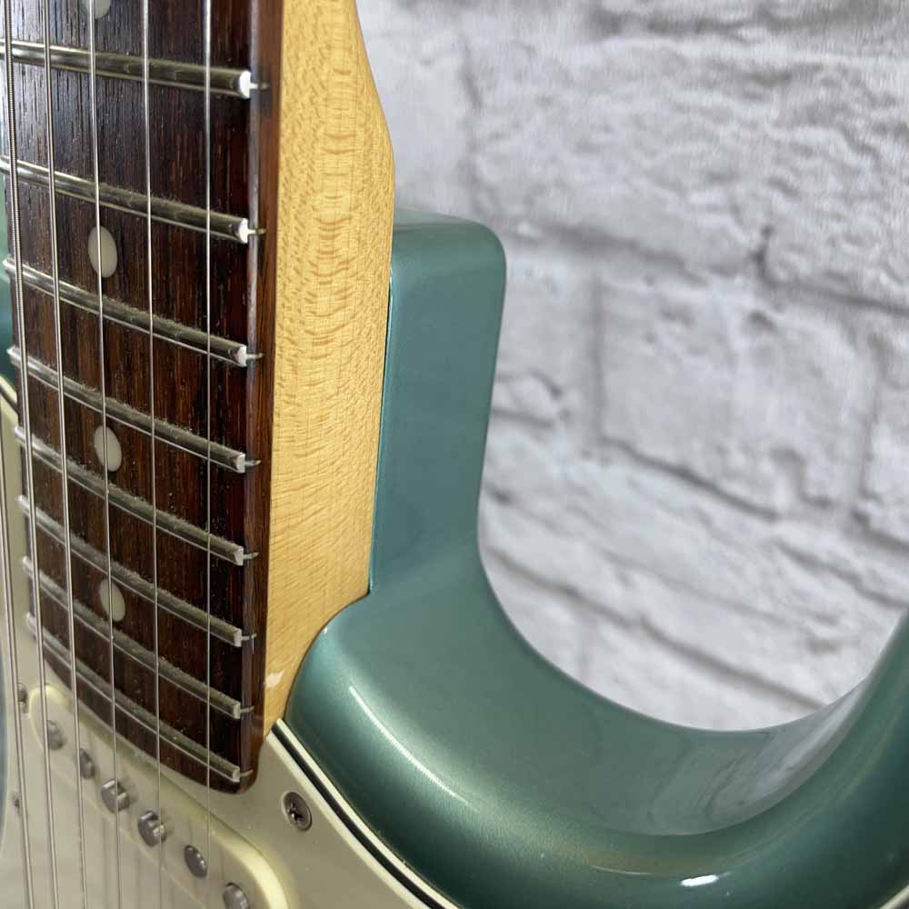 Used:   Tokai AST96 Stratocaster Electric Guitar - Turquoise Ocean Metallic