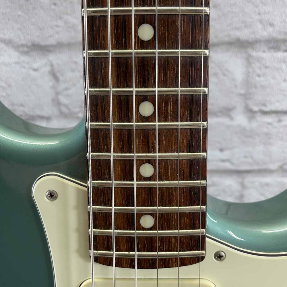 Used:   Tokai AST96 Stratocaster Electric Guitar - Turquoise Ocean Metallic