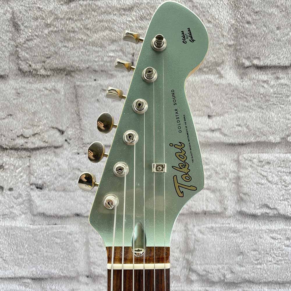 Used:   Tokai AST96 Stratocaster Electric Guitar - Turquoise Ocean Metallic