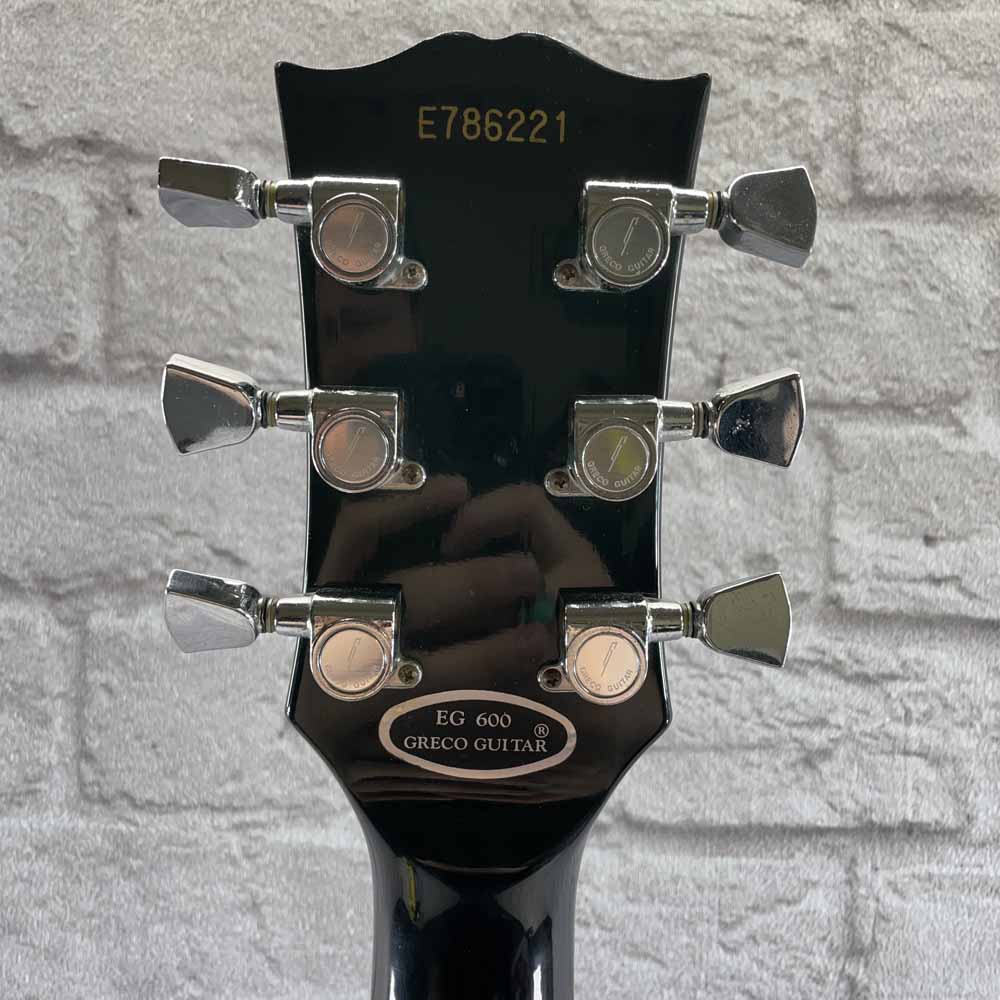 Used:   Greco 1977 EG600 Les Paul Deluxe Style Electric Guitar - Black