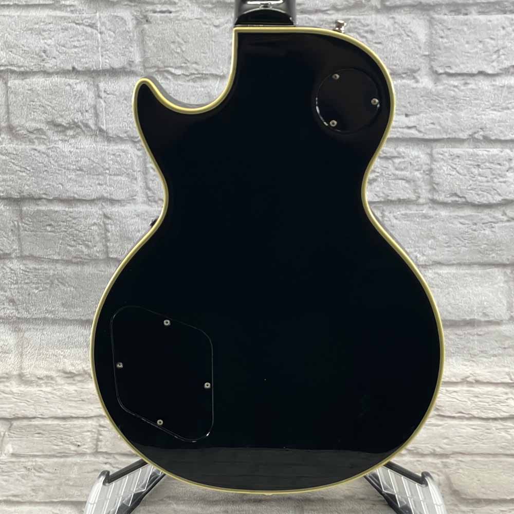 Used:   Greco 1977 EG600 Les Paul Deluxe Style Electric Guitar - Black