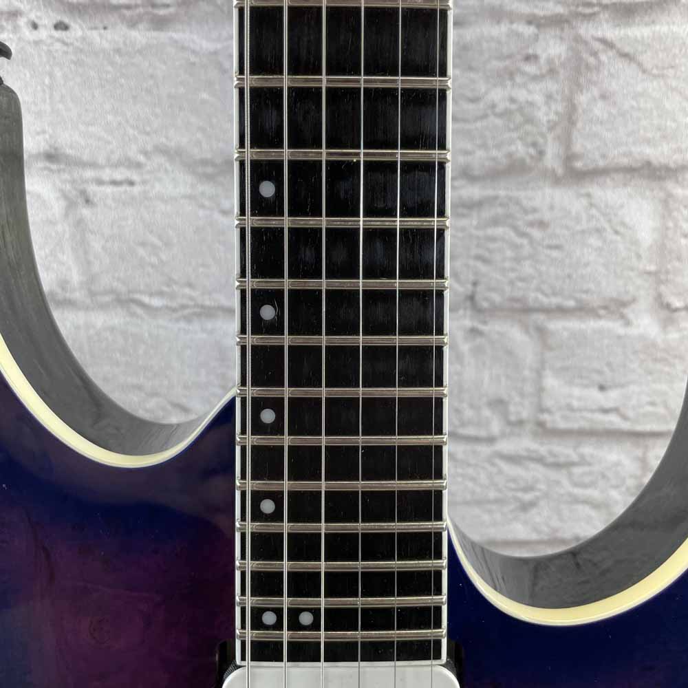 Used:  Ibanez RGIX6DLB-SNB Electric Guitar - Supernova Burst