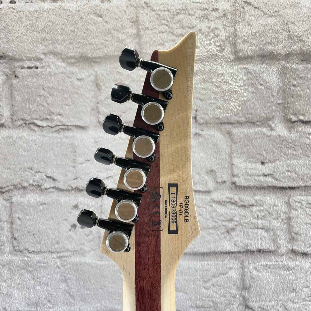 Used:  Ibanez RGIX6DLB-SNB Electric Guitar - Supernova Burst